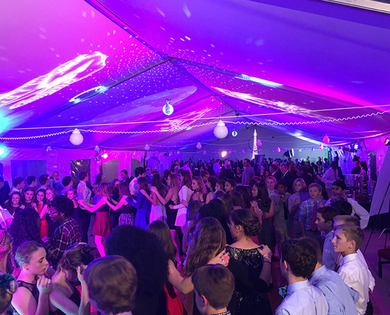 a group of people at a party celebrating