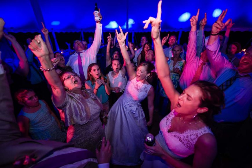 Guests Hollering on the Dance Floor at Wedding Reception