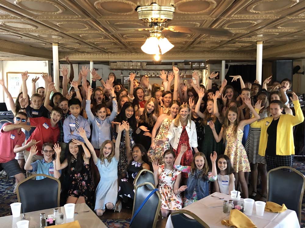 a group of school kids at a party