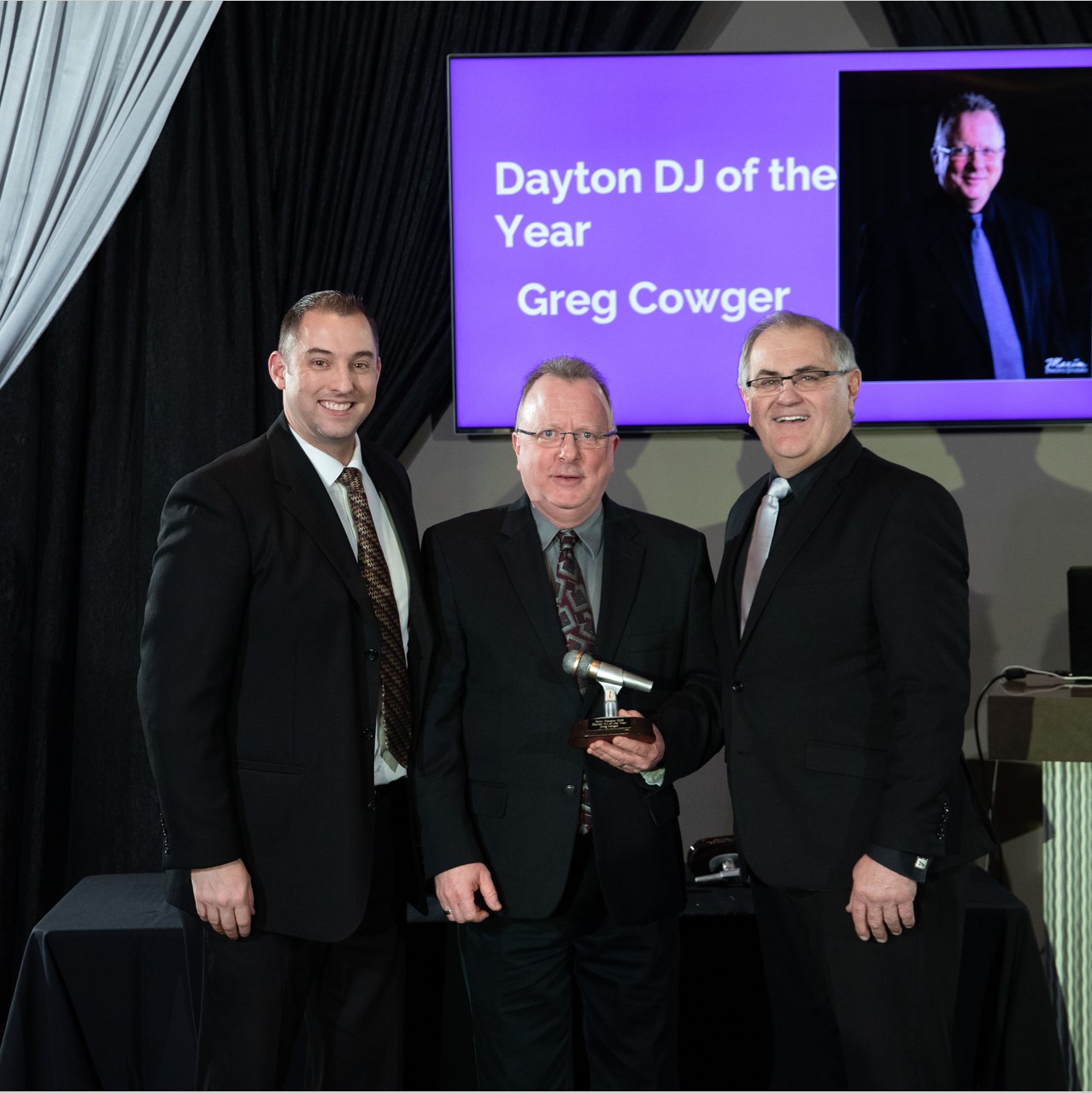 bride and groom entering party