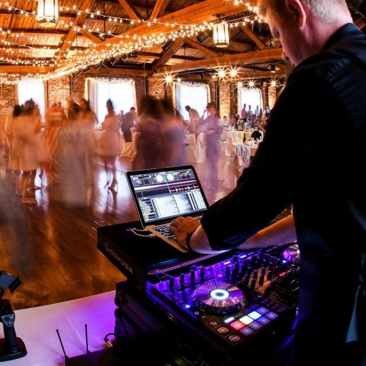 bride and groom entering party