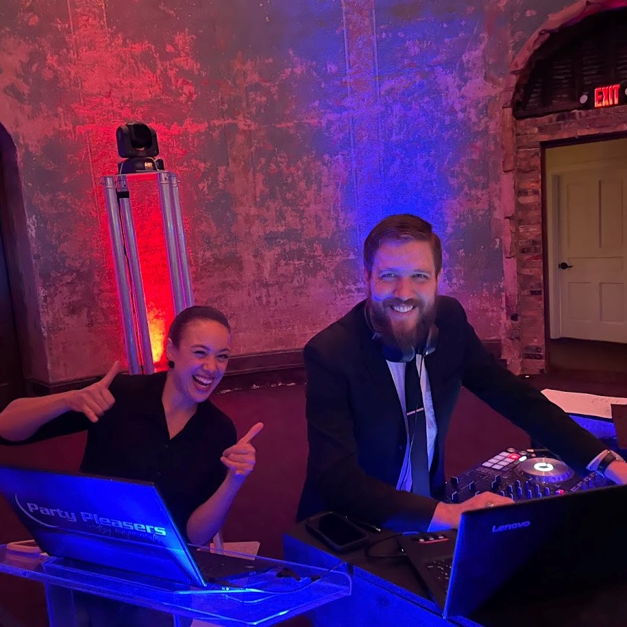 bride and groom entering party